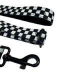 Adjustable dog leash with checkered strap and black metal clasp