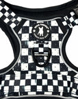 Cooling dog harness with handle, quick-release buckle, black and white checkered design, and Wag Trendz® logo