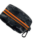 Dog Poop Bag Holder in black and gray camo with an orange zipper on a white background
