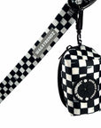 Dog poop bag holder attached to a matching black and white checkered leash