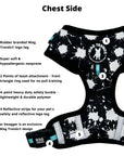 No Pull Dog Harness - black no pull dog harness with white paint splatter and teal accents with product feature captions - front clip for no pull training - against a solid white background - Wag Trendz