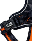 No Pull Dog harness with orange and black camo design and 'WAGTRENDZ' branding on a white background