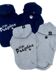 Hooded Sweatshirt For Dogs "Stay Pawsitive" hooded sweatshirt in black and gray sets - back view Stay Pawsitive with paw print front view with paw print - against solid white background - Wag Trendz