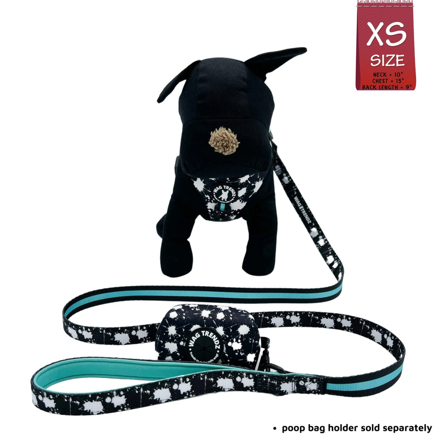 Dog Harness and Leash Set - Black stuffed dog wearing black harness vest in white paint splatter with teal accents in size x small with matching leash - against solid white background - Wag Trendz