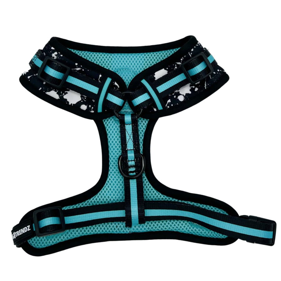 Dog Harness Vest - No Pull - black adjustable harness with white paint splatter and teal accents - front clip for no pull training - against a solid white background - Wag Trendz
