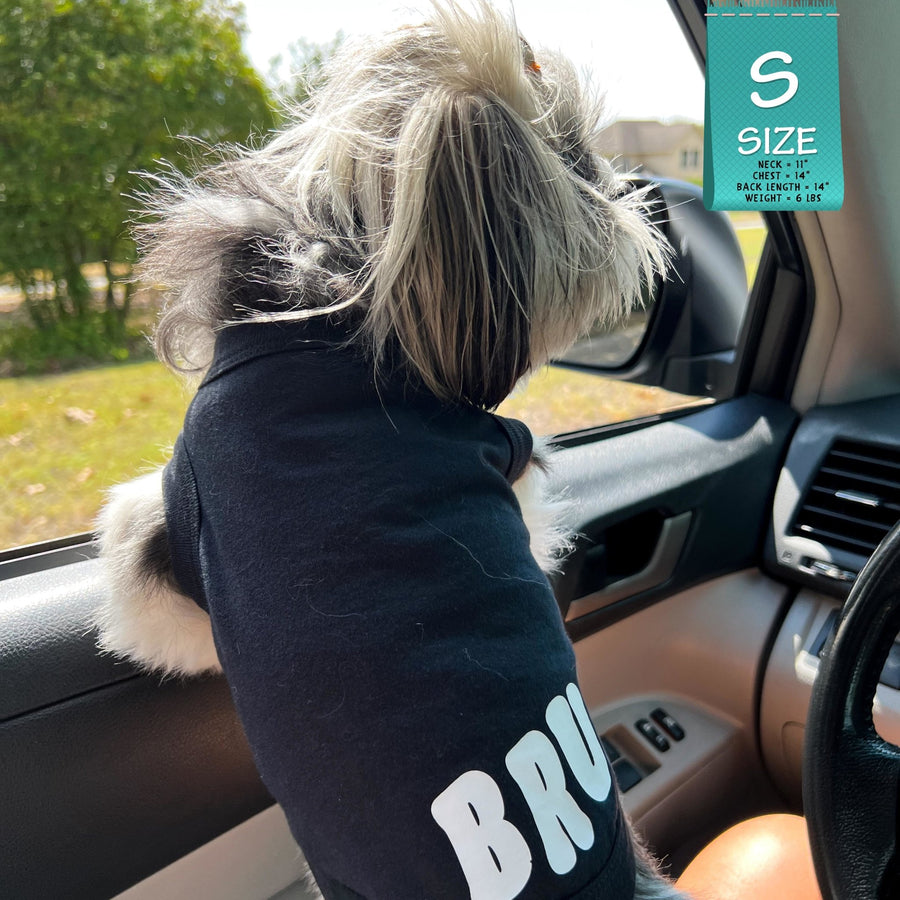 Dog T-Shirt - Shih Tzu mix wearing "Bruh" dog t-shirt in Black - back view with BRUH spelled in white on black t-shirt - hanging head out car window - Wag Trendz