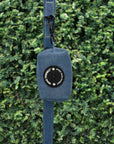 Harness and Leash Set + Poop Bag Holder - Downtown Denim Dog Leash hanging with matching Poop Bag Holder attached - against a greenery wall background - Wag Trendz