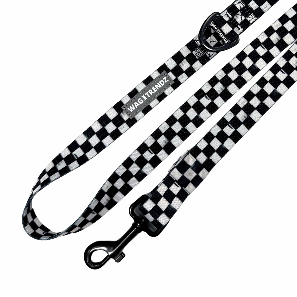 Adjustable dog leash with swivel clasp, buckle, and black and white checkered strap