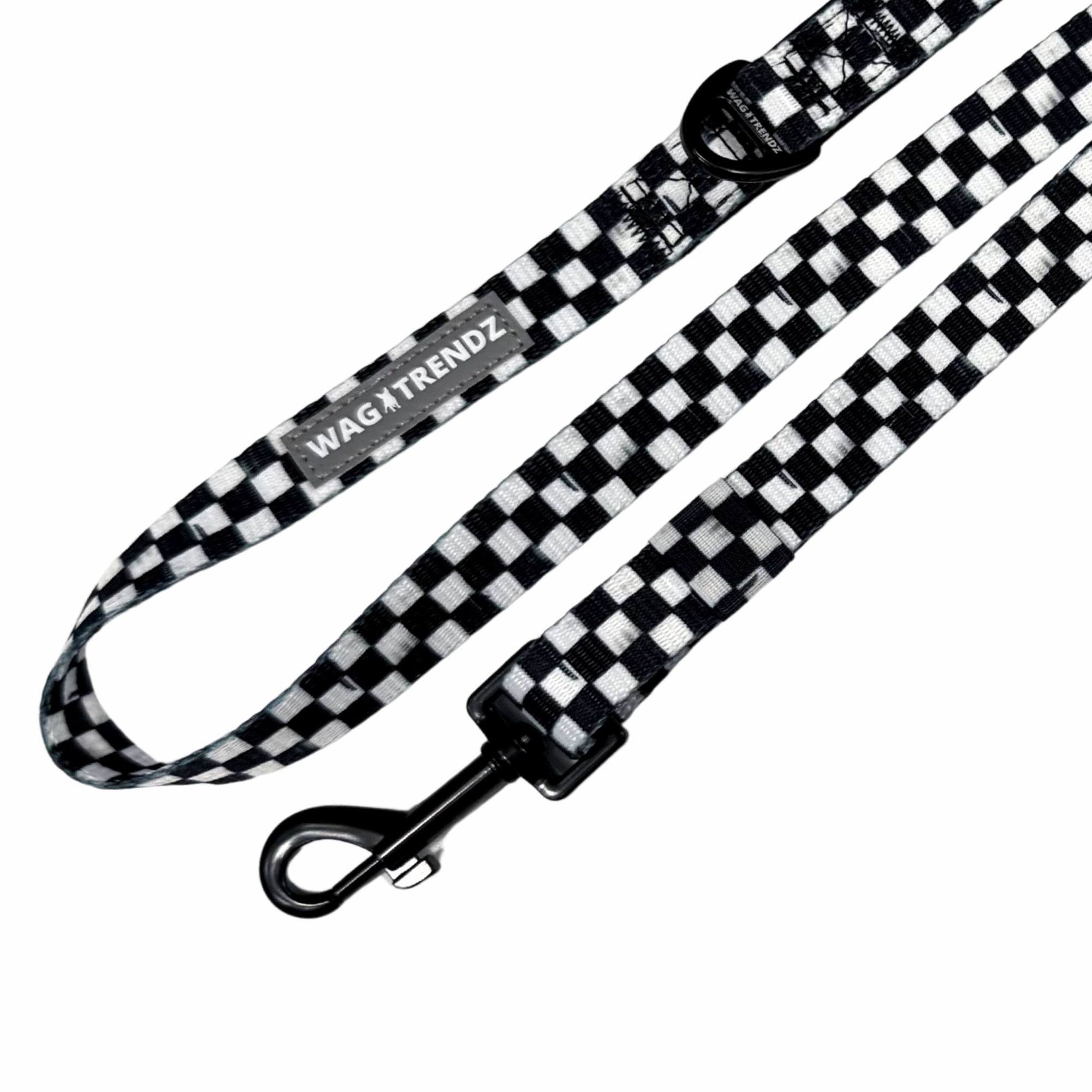 Adjustable dog leash in black &amp; white checkered with swivel clasp and reflective Wag Trendz® label