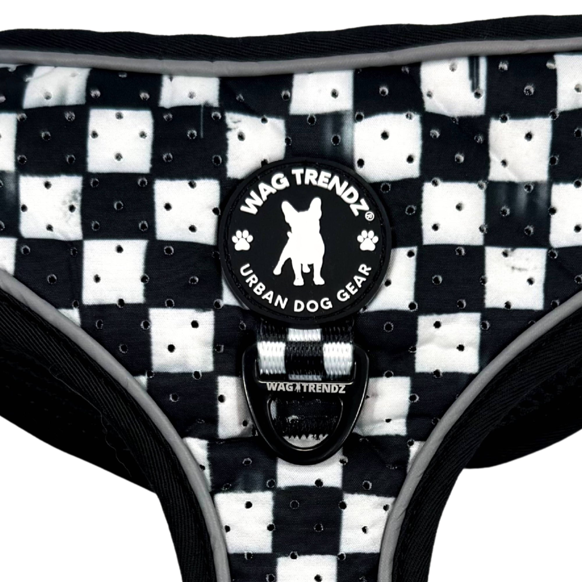 Cooling dog harness with black and white checkered design and breathable perforated neoprene