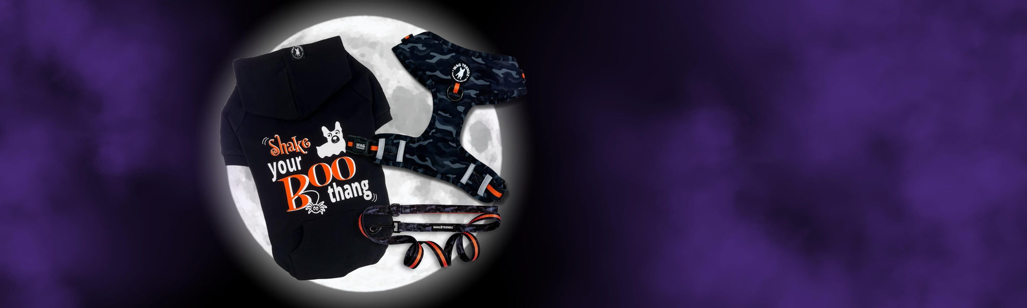 Hooded Sweatshirts For Dogs - Black Halloween hooded sweatshirts "Shake Your Boo Thang" and Camo and Orange dog harness and leash set - against full moon and purple fog background - Wag Trendz