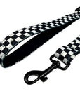 Adjustable dog leash with black and white checkered design and black snap hook