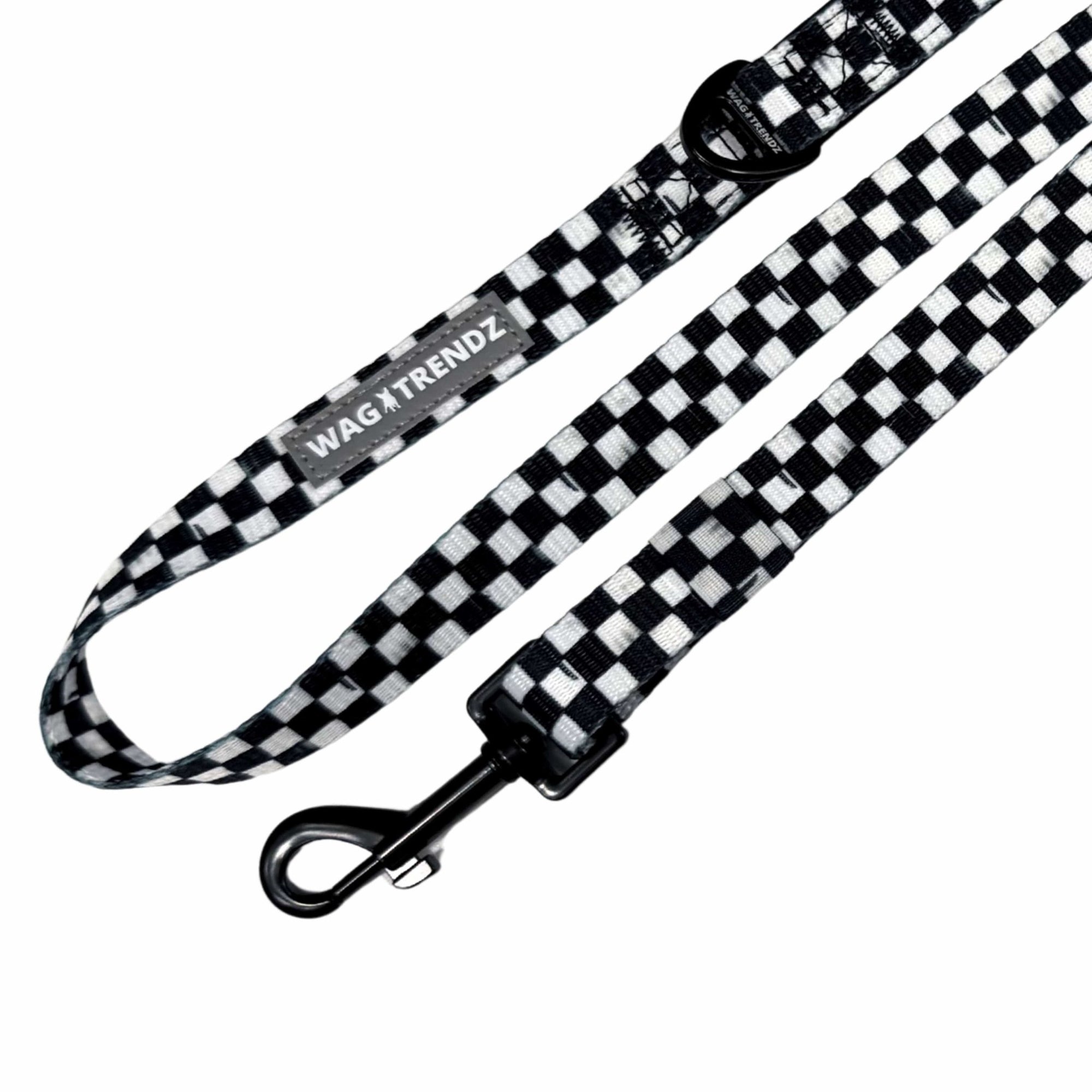 Adjustable dog leash in black & white checkered with swivel clasp and reflective Wag Trendz® label