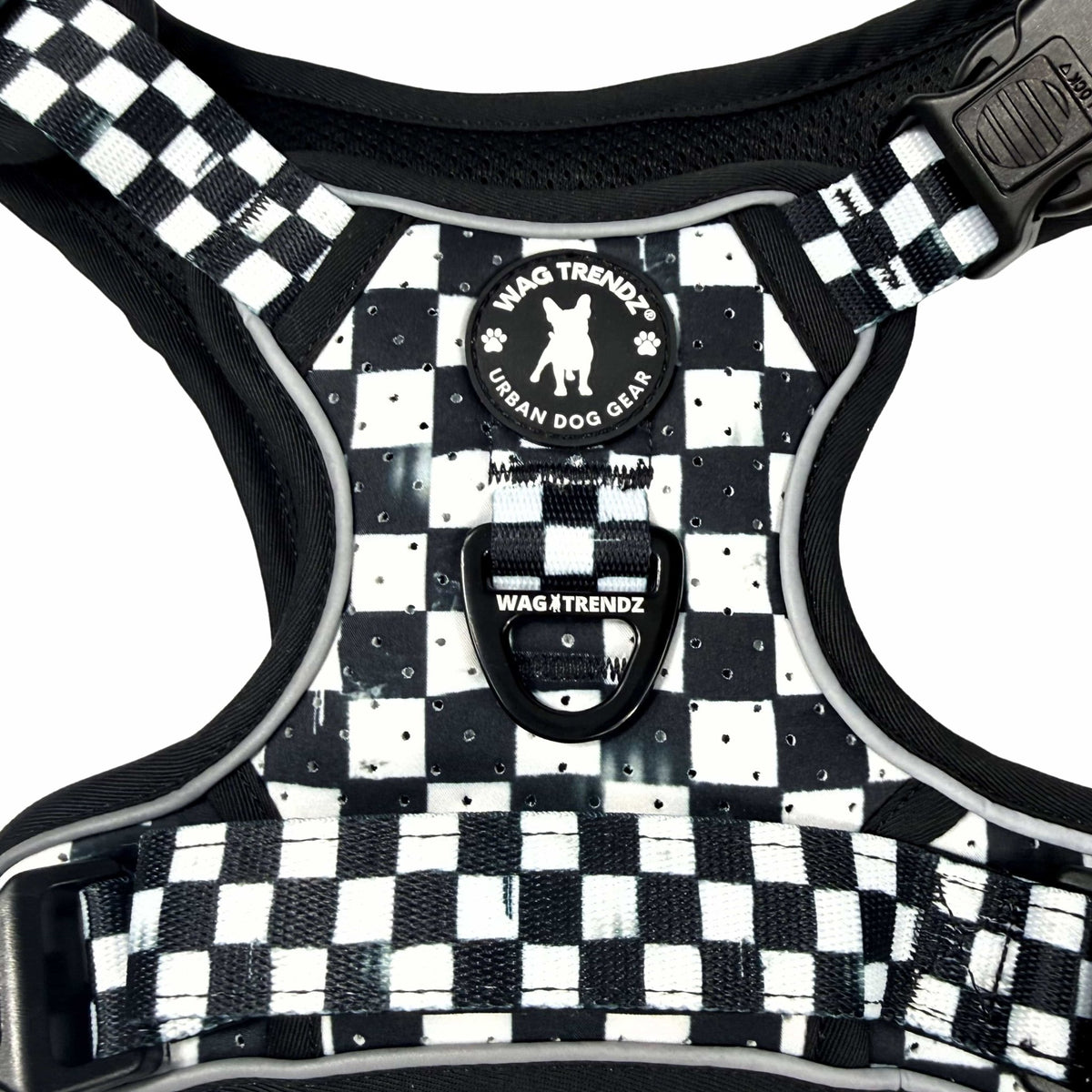 Cooling dog harness with handle, quick-release buckle, black and white checkered design, and Wag Trendz® logo
