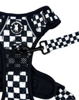 Cooling dog harness with handle, matching black and white checkered leash, and black metal bolt clip