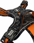 No Pull Dog harness with camouflage pattern and orange accents on a white background