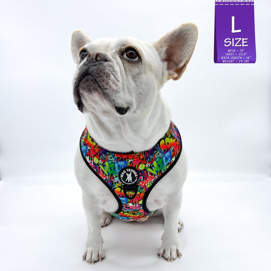 Dog Harness Vest - Adjustable - Front Clip - worn by cute white Frenchie Bulldog - multi-colored street graffiti design against solid white background - front view - Wag Trendz