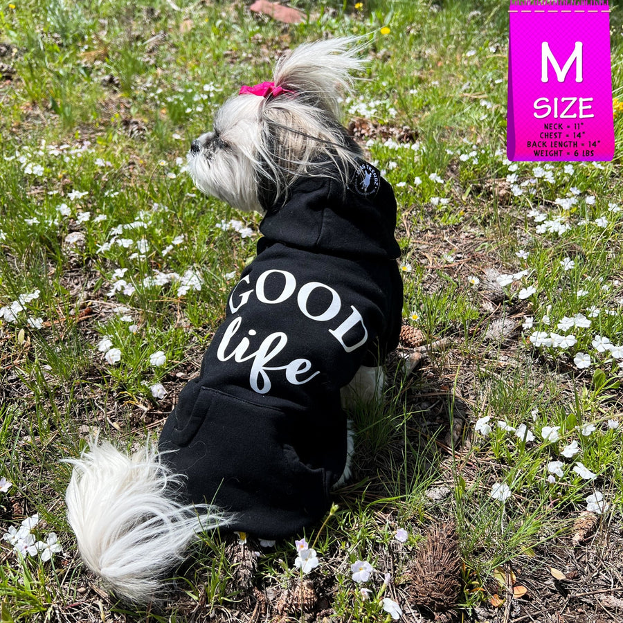 Dog Hoodie - Hoodies For Dogs - Shih Tzu mix wearing "Good Life" dog hoodie in black - back view - Good Life on the back - sitting outdoors in a grassy field - Wag Trendz