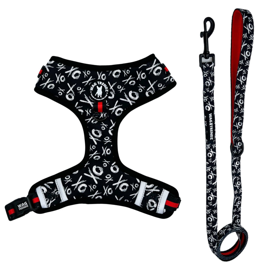 Dog Leash and Harness Set - Dog Harness Vest in black with white XOs and red accents - matching dog leash - against solid white background - Wag Trendz